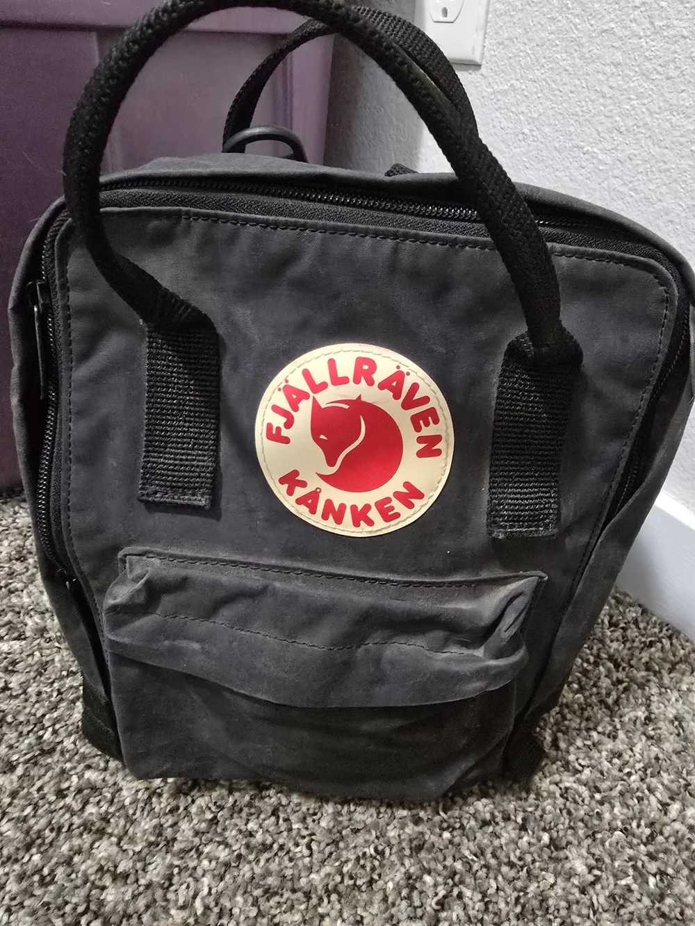 Fjallraven Black Backpack with Red Logo